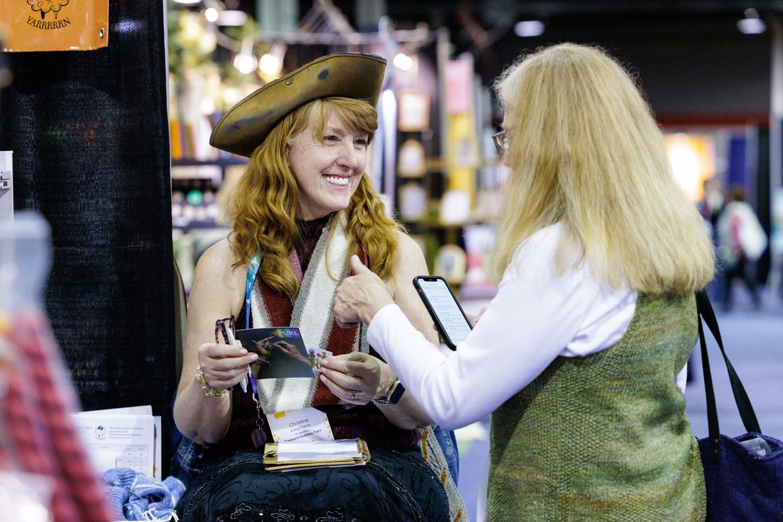 Attendee shopping an exhibitor booth